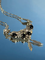 Load image into Gallery viewer, Vintage 1970s Silver Native American Floral design Necklace w/ Onyx Stone
